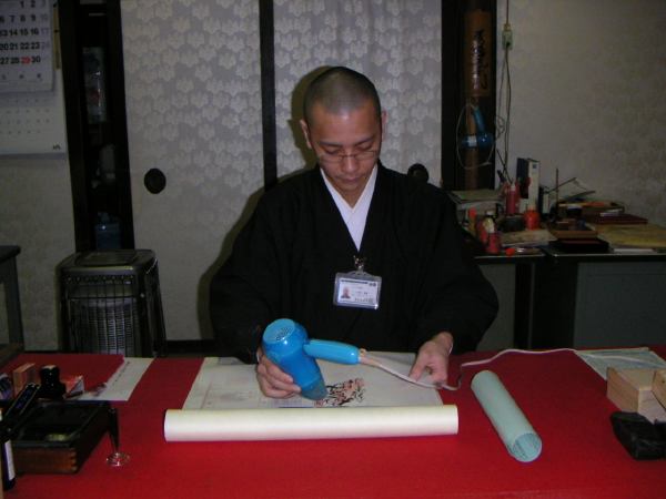 Drying the caligraphy on Alicia's pilgriimage scroll